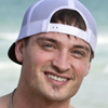 Survivor cast photo of Caleb Reynolds
